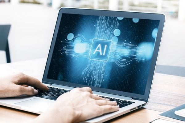 Artificial intelligence Business person using artificial intelligence tools on laptop