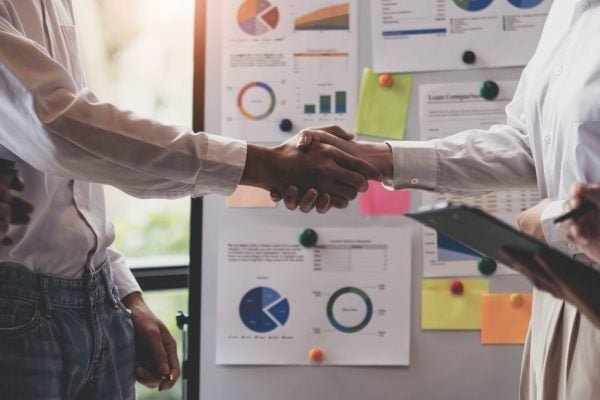 business-handshake-for-teamwork-of-business-merger-2023-11-27-05-25-20-utc-scaled business-handshake-for-teamwork-of-business-merger-2023-11-27-05-25-20-utc-scaled