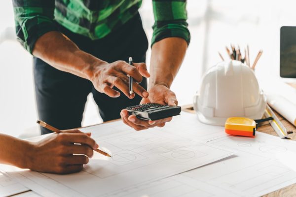 engineers-work-as-a-team-with-blueprints-for-archi-2023-11-27-04-56-49-utc-scaled engineers-work-as-a-team-with-blueprints-for-archi-2023-11-27-04-56-49-utc-scaled